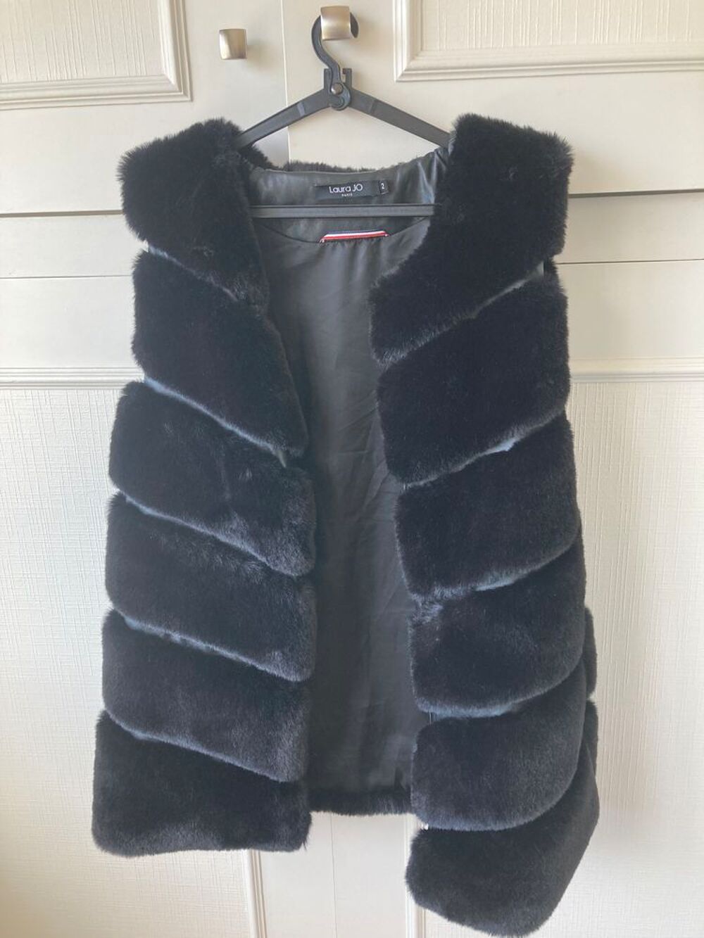 Veste sans manche Vêtements