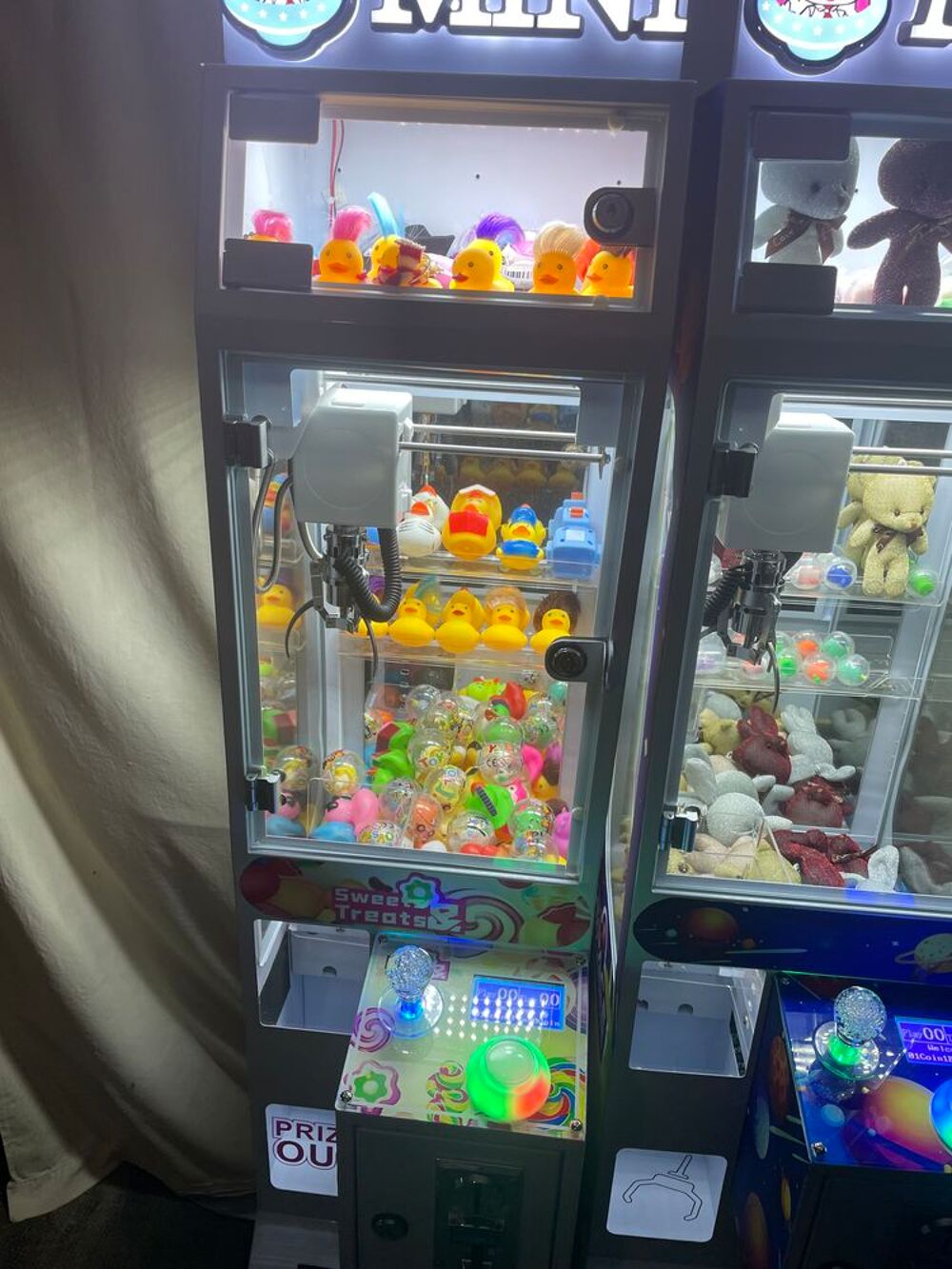 Machine &agrave; pince attrape peluche Jeux / jouets