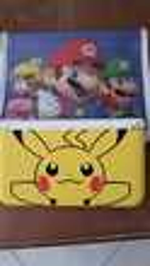 Console 3ds s&eacute;rie limit&eacute;e pikachu
avec pokemon rubi neuf Consoles et jeux vidéos
