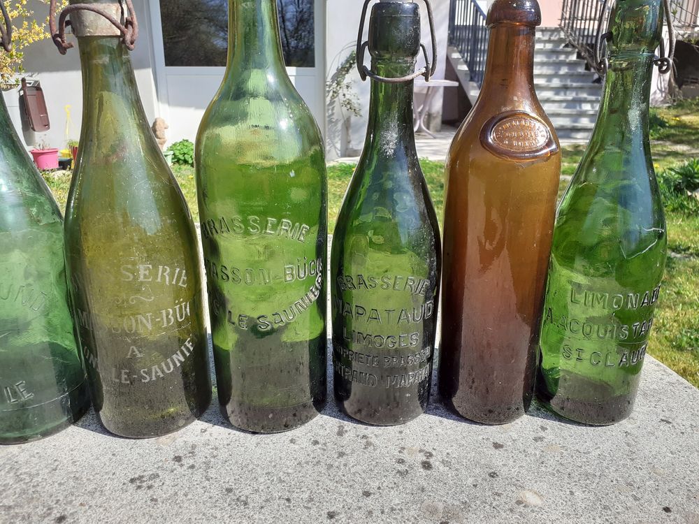 12 Bouteilles diverses LIMONADE ou BRASSERIE . 
