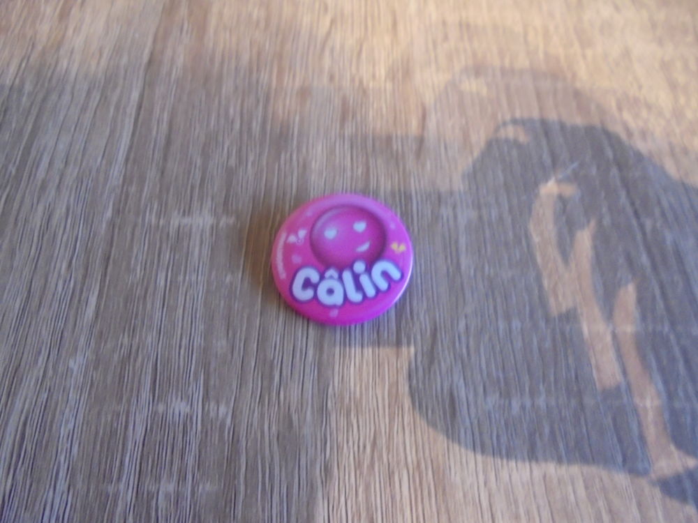 Badge "C&acirc;lin" (28b) Bijoux et montres