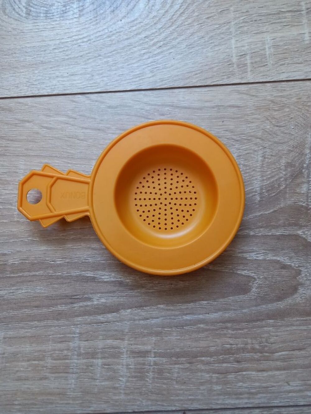 Mini passoire orange Bonux 