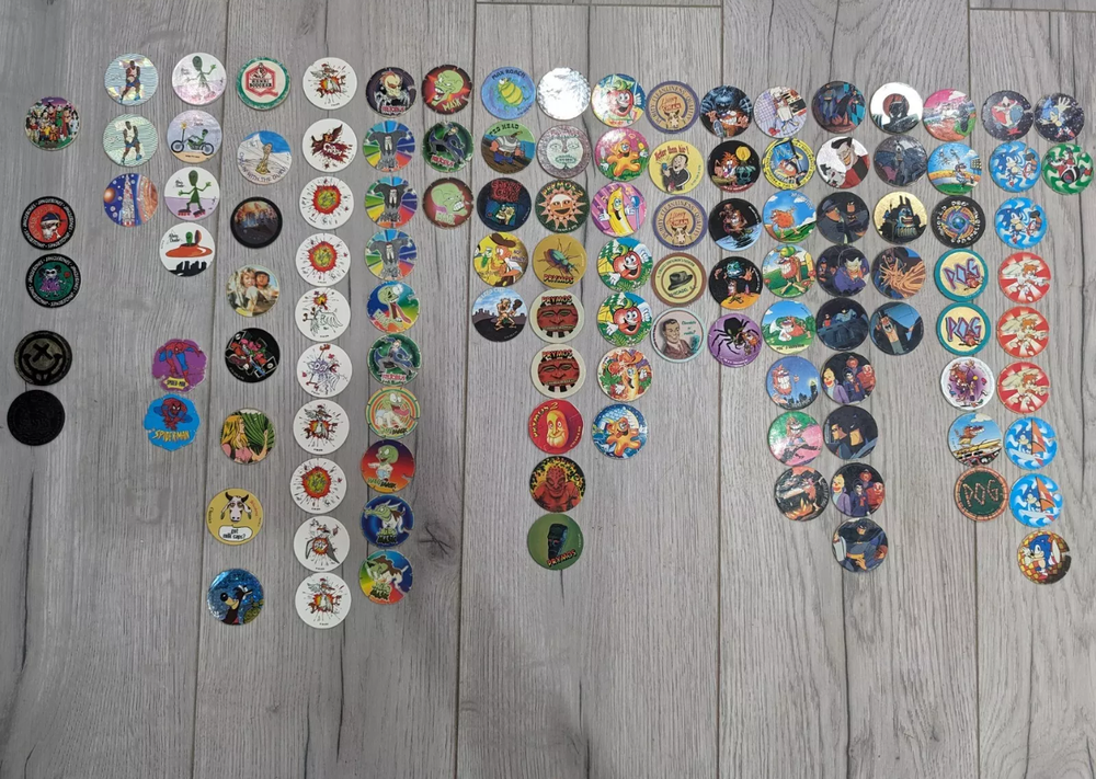 Lot de 115 Pogs + 2 Lance Pogs (ann&eacute;e 90) Jeux / jouets