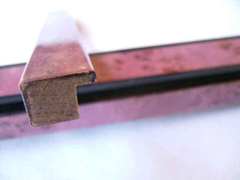 
28,80 m de baguettes bois en loupe rose pour cadres 80 Wolxheim (67)