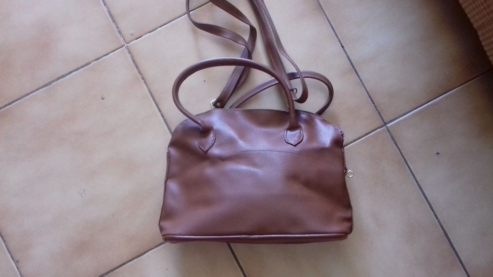 Sac &agrave; main de femme
De couleur marron
Maroquinerie