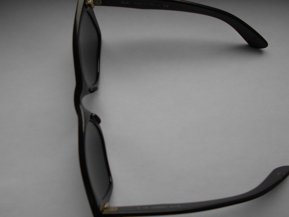 lunettes de soleil ray ban femme marron fonc&eacute; forme papillon Bijoux et montres