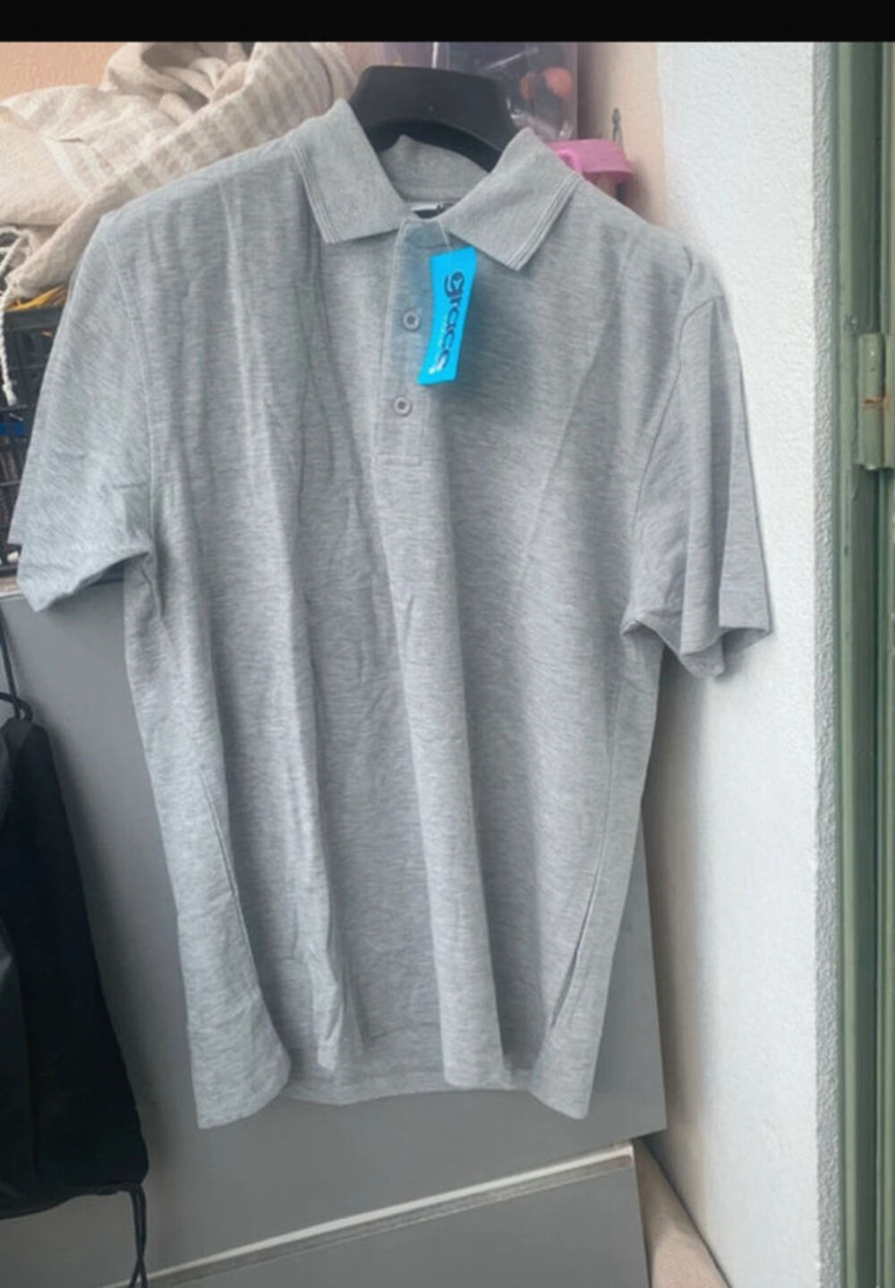 Polo Gris chin&eacute; Marque
Grace collection / taille M -
Vêtements