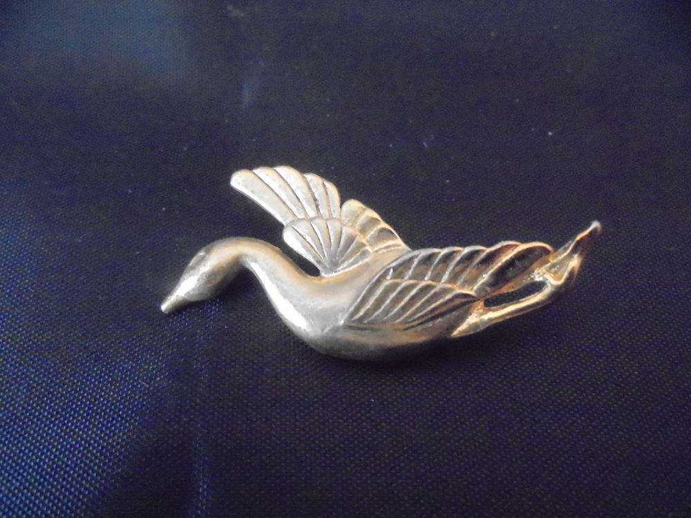 broche, m&eacute;tal dor&eacute; , canard Bijoux et montres