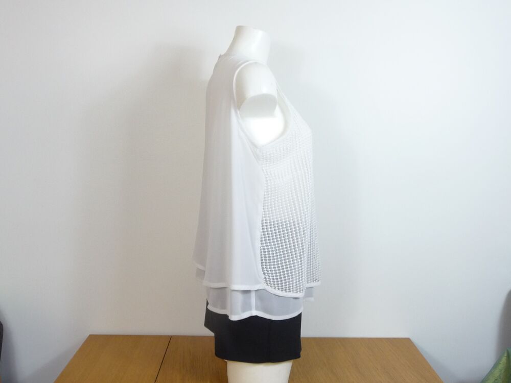 Double Top Blanc Ajour&eacute; Devant sans manches- Yessica Vêtements