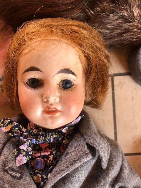 POUP�E TETE PORCELAINE 0 Mouillac (33)