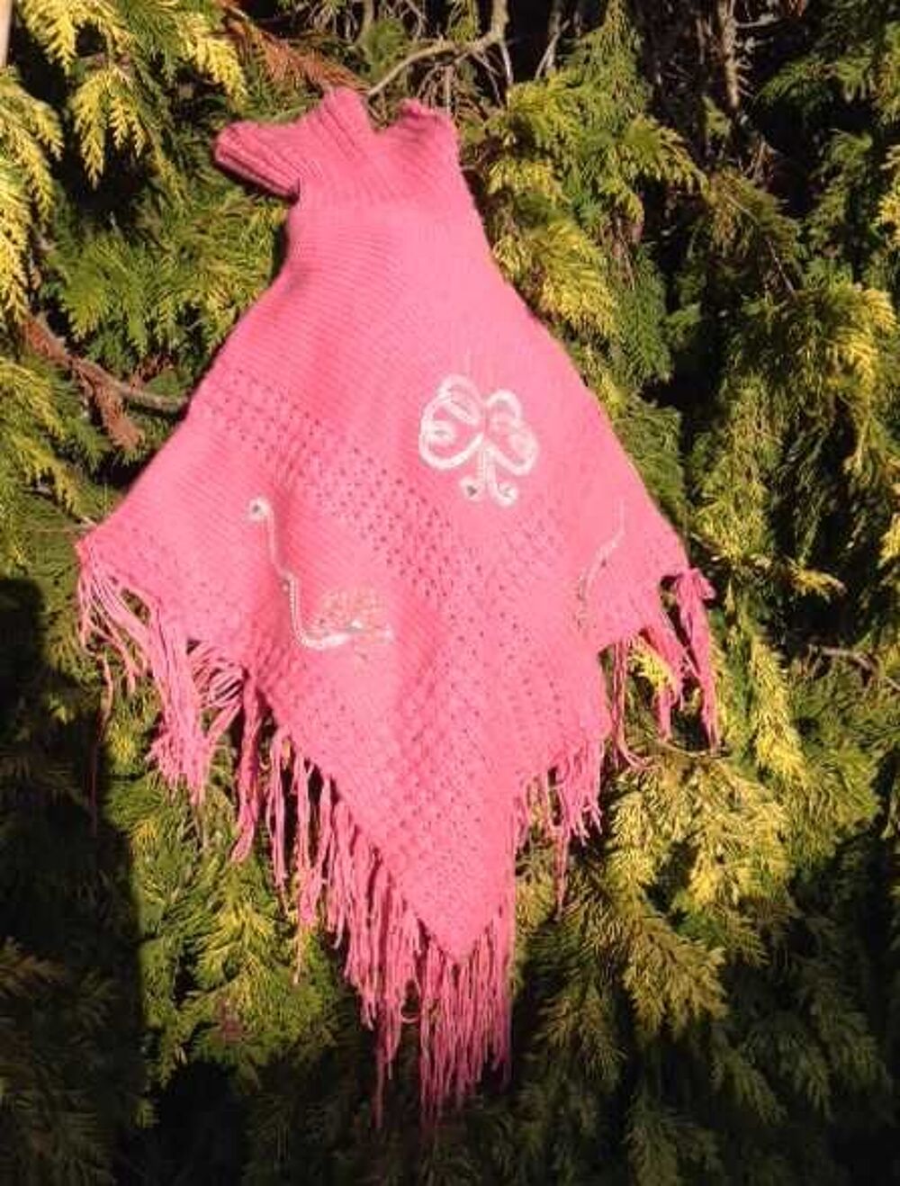 Poncho tricot rose
Vtements