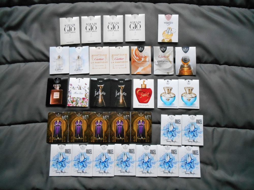 Lot de 33 Puffers de parfum divers 