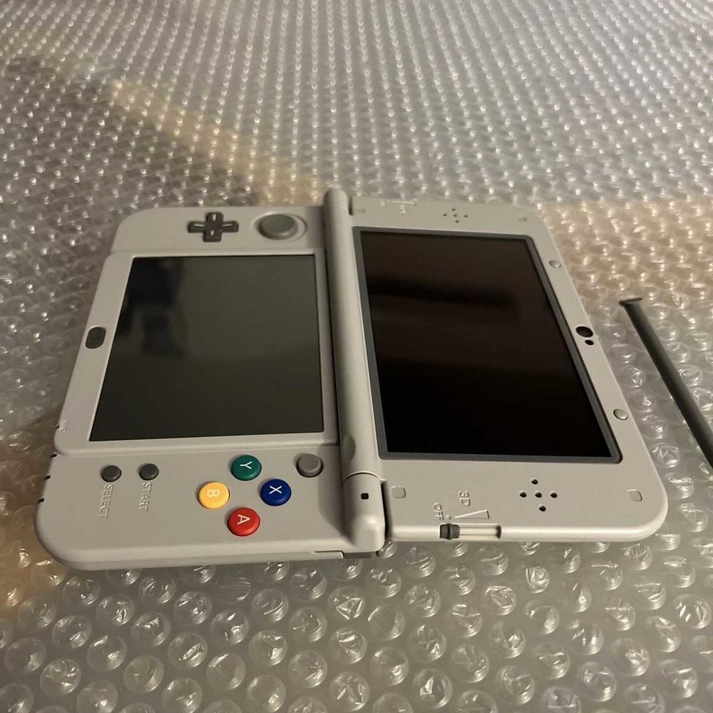 New 3ds xl &eacute;dition super Nintendo Consoles et jeux vidéos