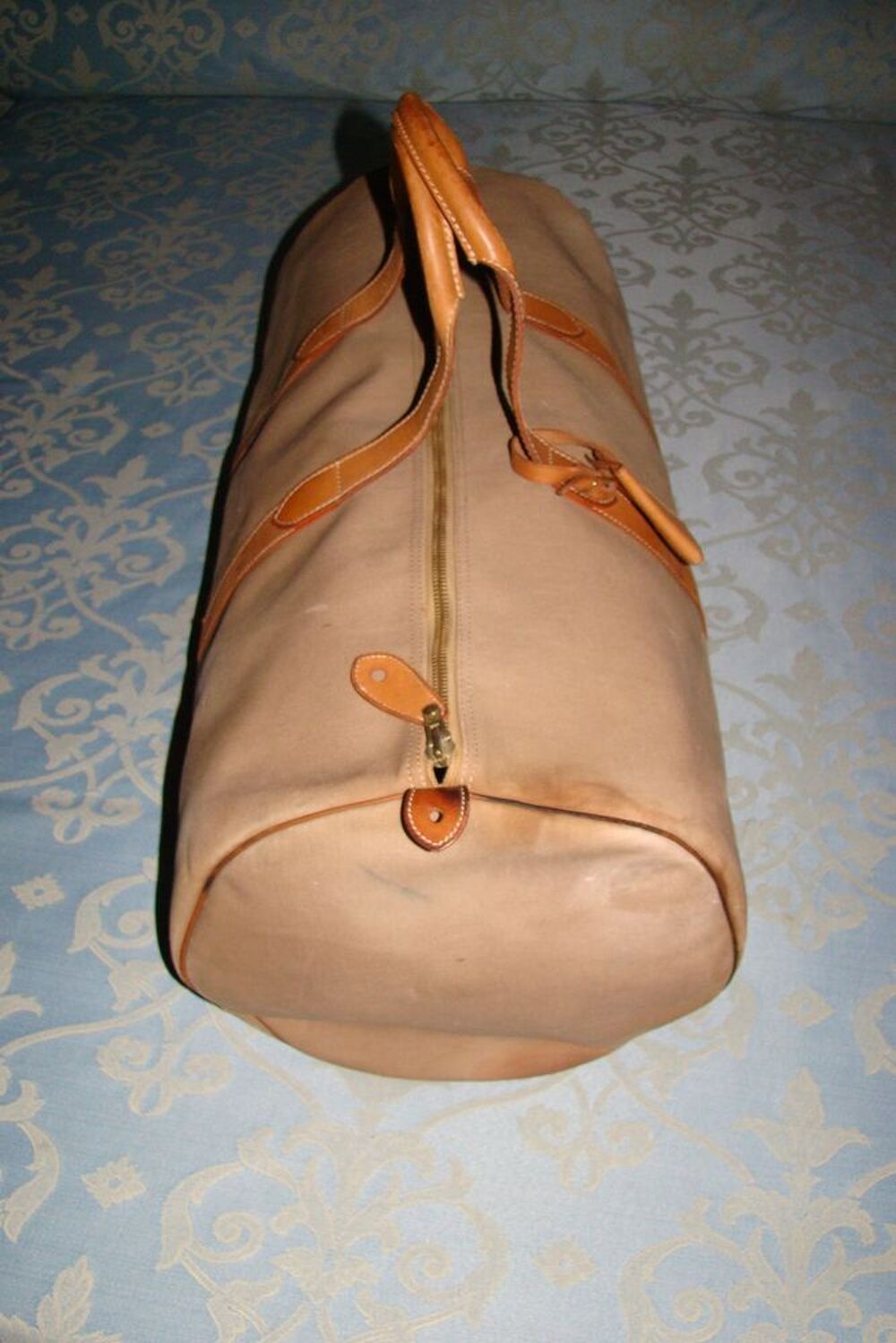 Ancien sac de voyage Dior vintage
Maroquinerie