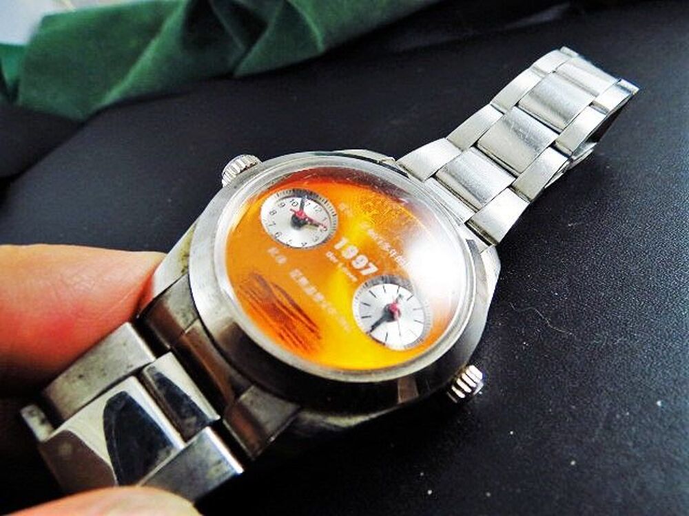DER L&Ouml;WE 1997 MONTRE 2 cadrans DIV0313 Bijoux et montres