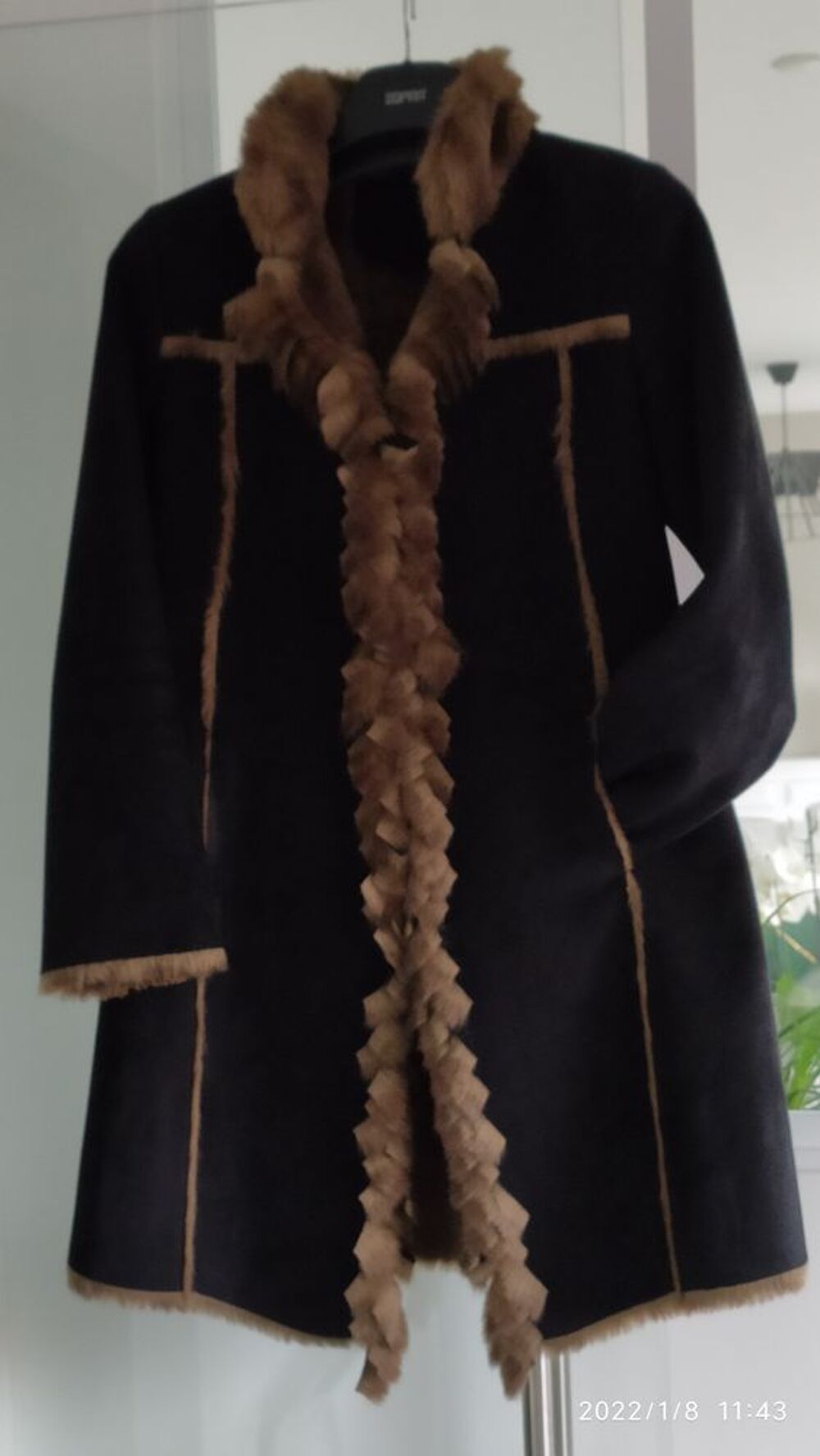 Manteau en Jean's bleu
Vêtements