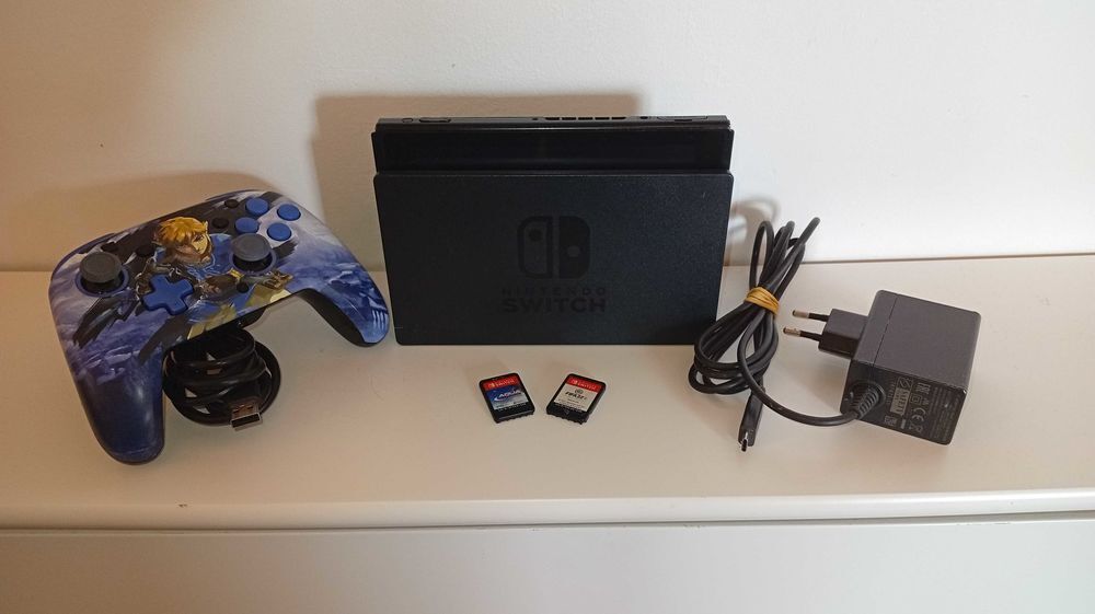 Switch et 2 Jeux Manette Zelda Consoles et jeux vidéos