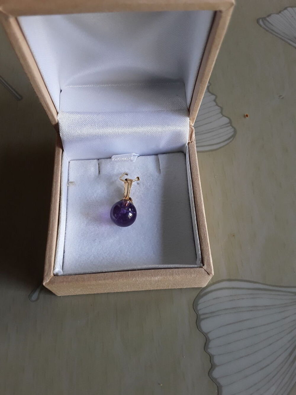 Pendentif perle violette Bijoux et montres