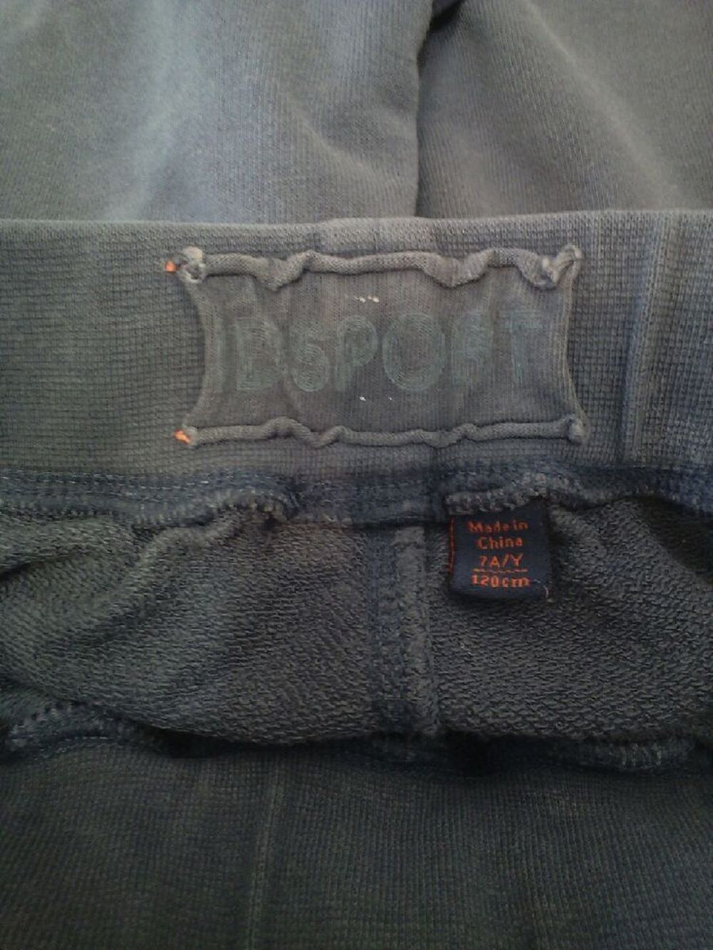 Short de sport bleu OKA&Iuml;DI 7 ans - TBE Vêtements enfants