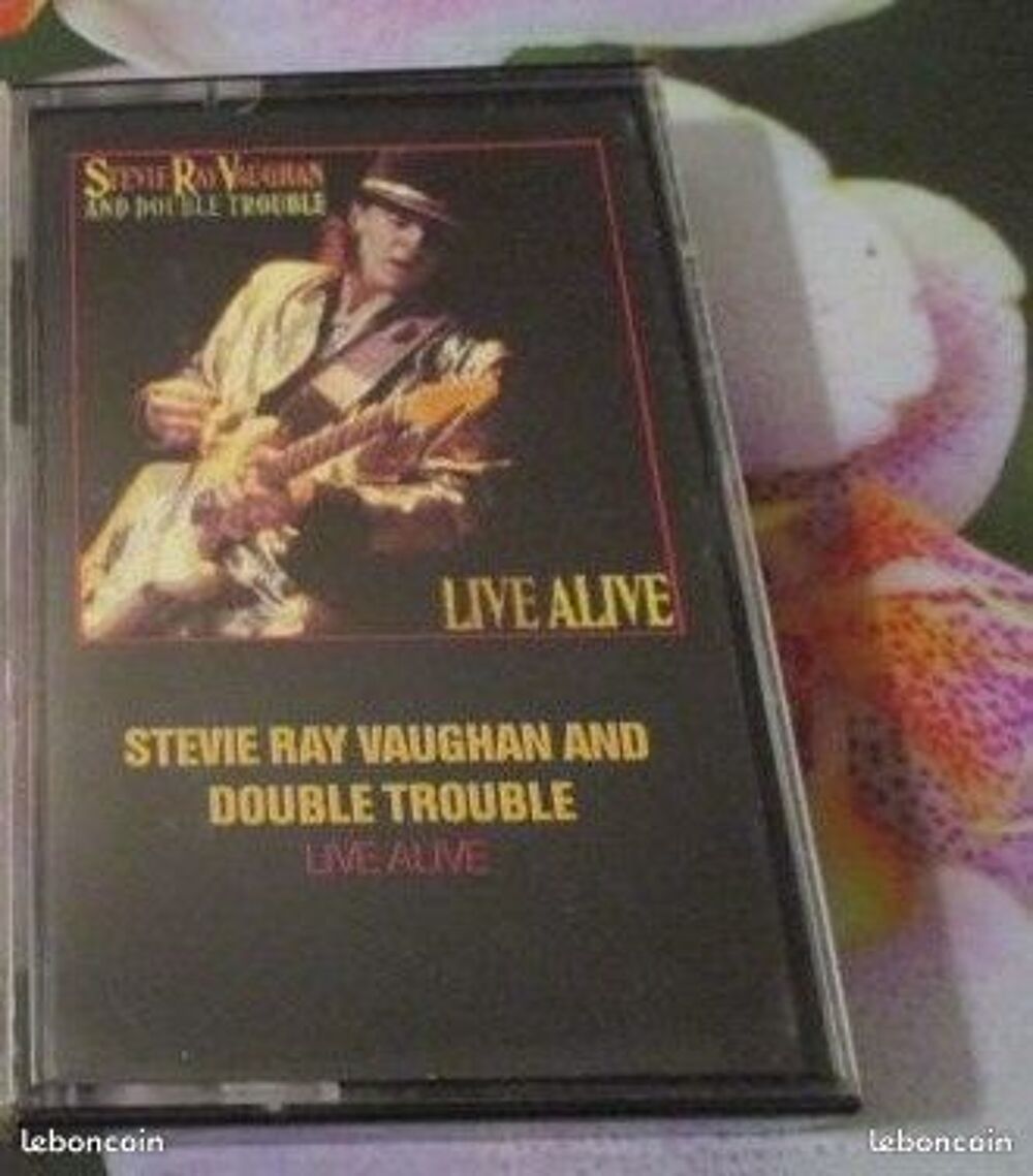 Cassettes audio Stevie Ray Vaughan &amp; Double Trouble 
CD et vinyles