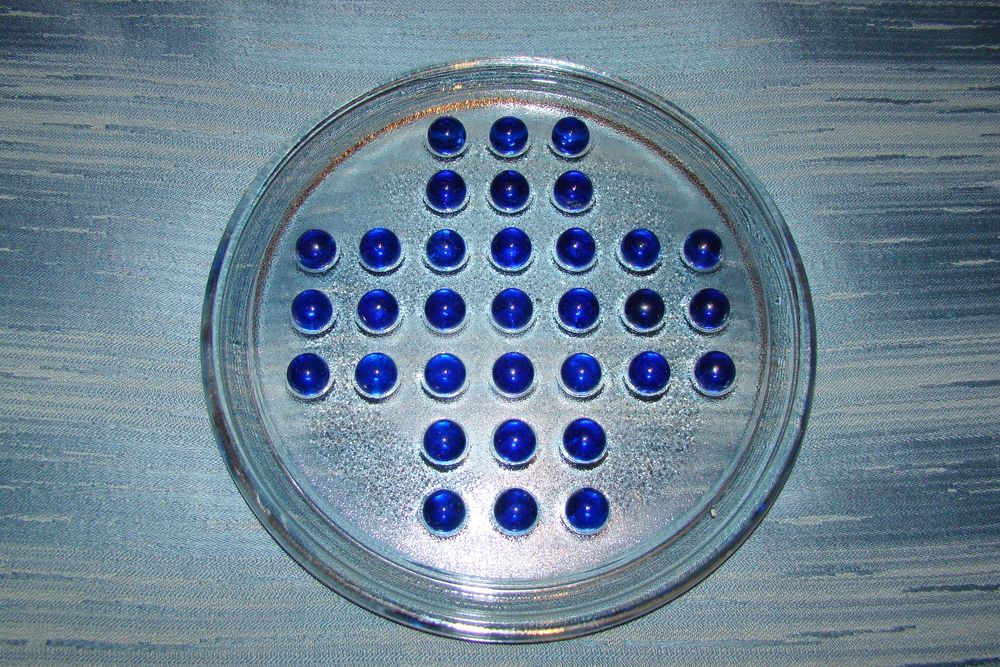 Jeu de solitaire en verre
Jeux / jouets