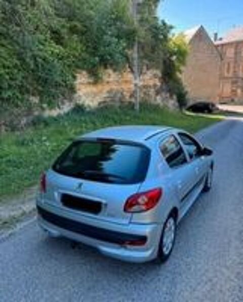 206 1.1i Pop Art 2012 occasion 08200 Sedan