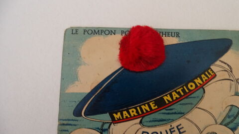CARTE  POSTALE Le  Pompon porte bonheur Bar-le-Duc (55)