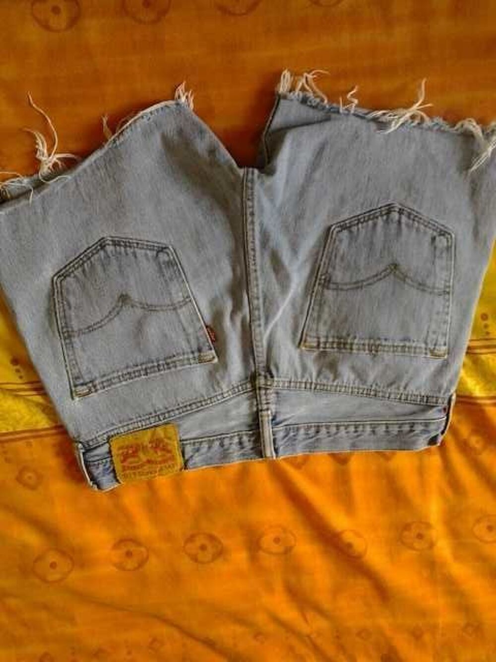un short marque levis original taille 36 europ&eacute;enne Sports