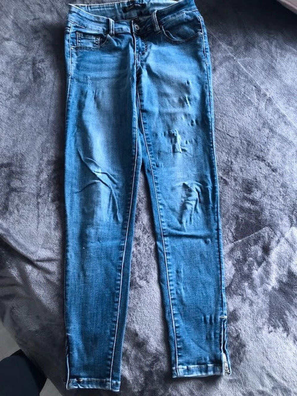 Jeans moulant Vêtements