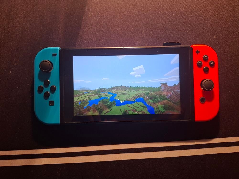 Console Nintendo Switch HAC001 en boite, compl&egrave;te Consoles et jeux vidéos