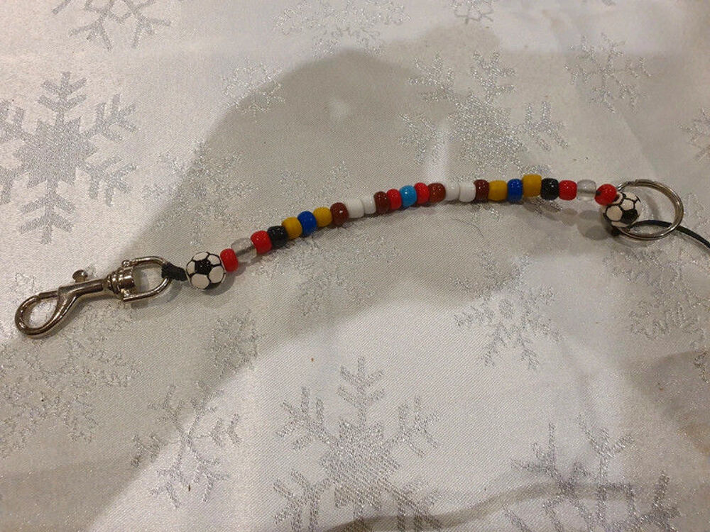 Porte cl&eacute;s en perle Bijoux et montres