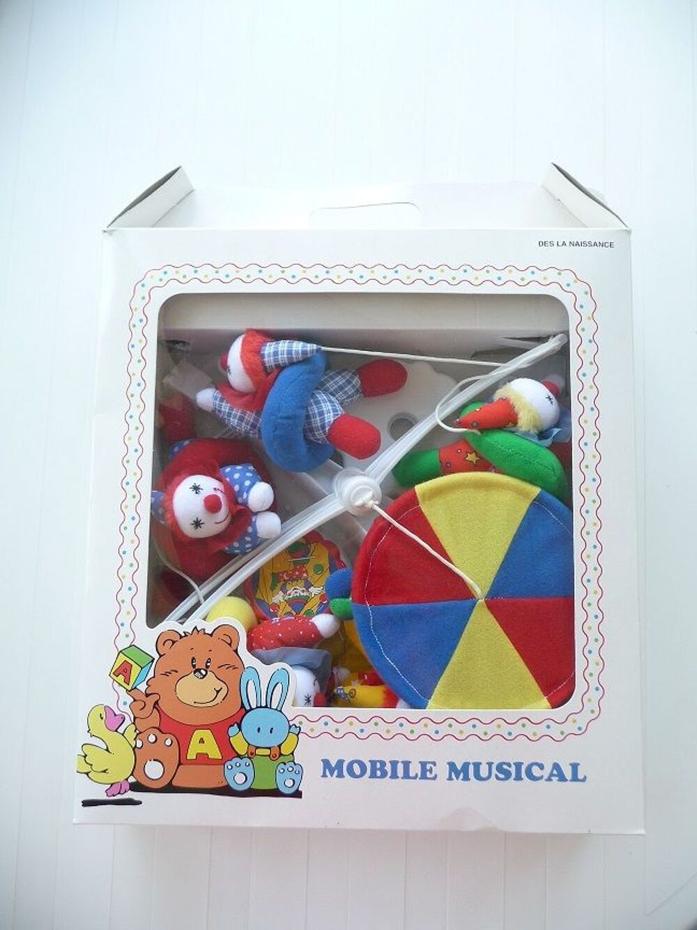 Mobile musical clowns et boite musicale dans son emballage Puériculture