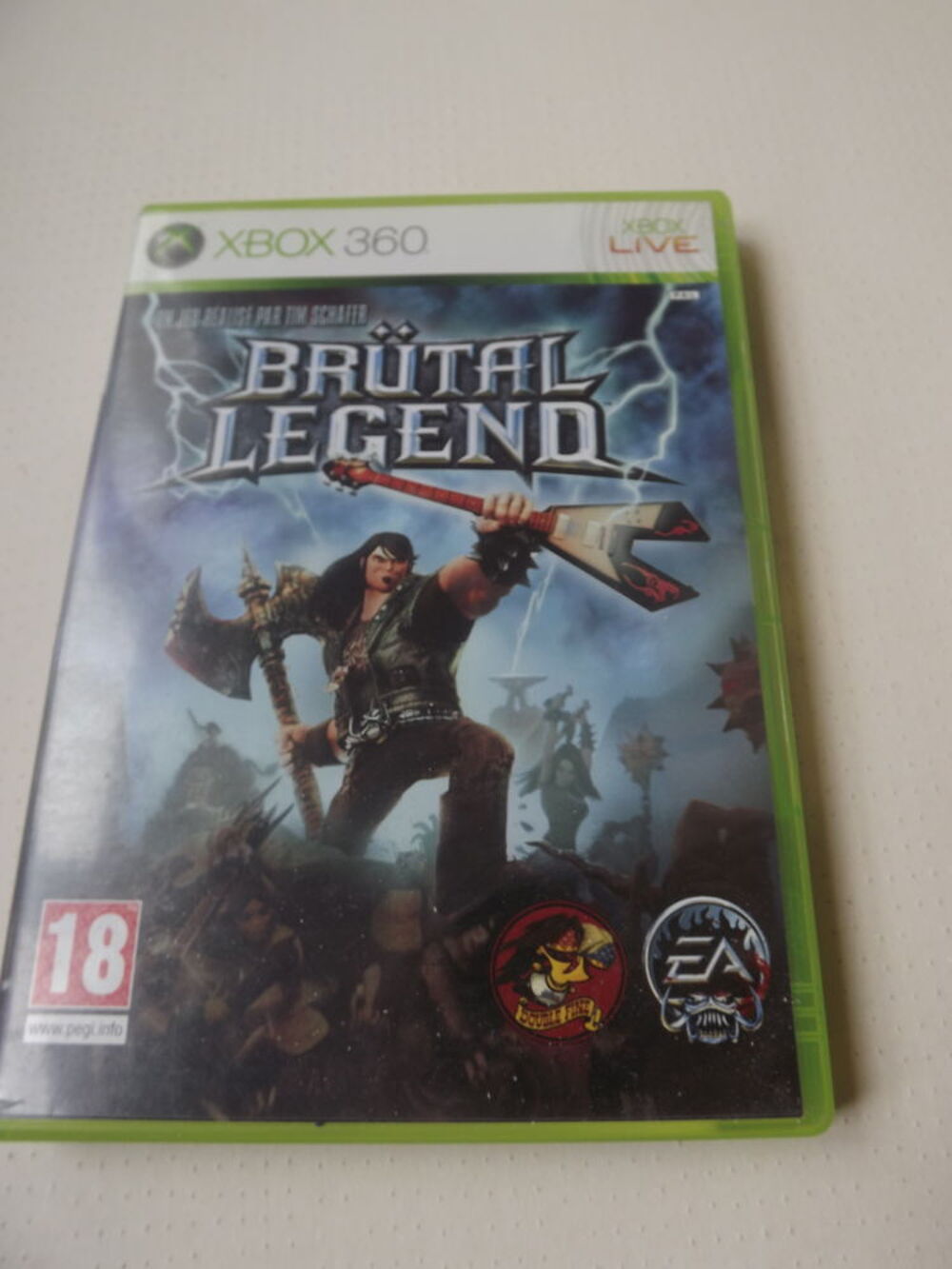 Jeu Xbox 360 brutal legend sans notice Consoles et jeux vidéos