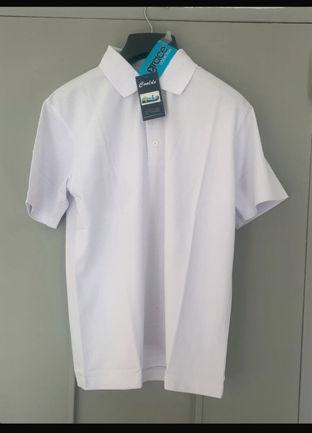 Polo blanc Marque Grace
Collection - Taille S Vêtements
