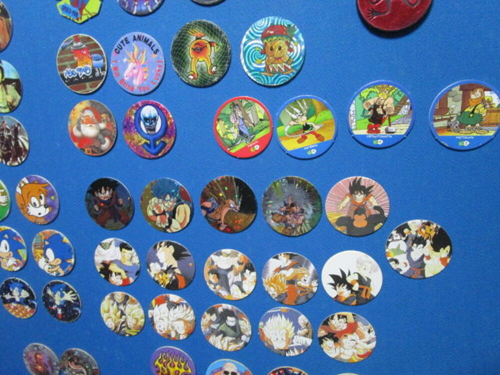 LOT 120 POG"PUBLICITAIRE-FOOTBALL-TAZ-DBZ-CINEMA-MASK" Jeux / jouets