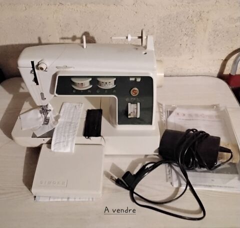 MACHINE � COUDRE MARQUE SINGER PORTABLE  ELECTRIQUE.. 75 Cormes (72)