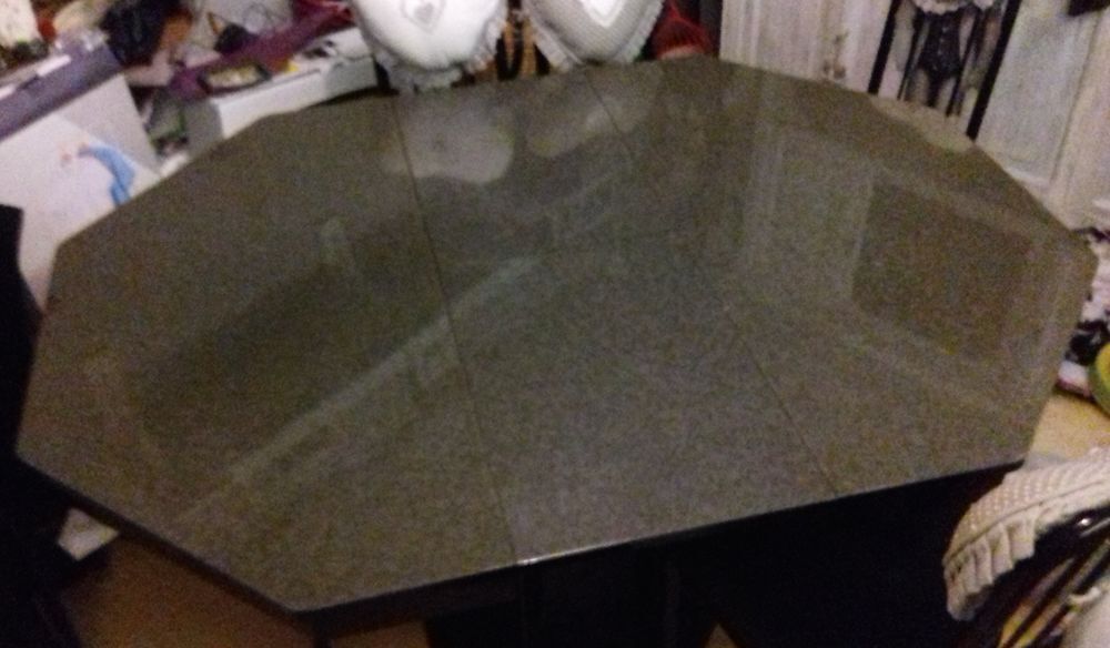 table octogonale avec rallonges int&eacute;gr&eacute;es
Meubles