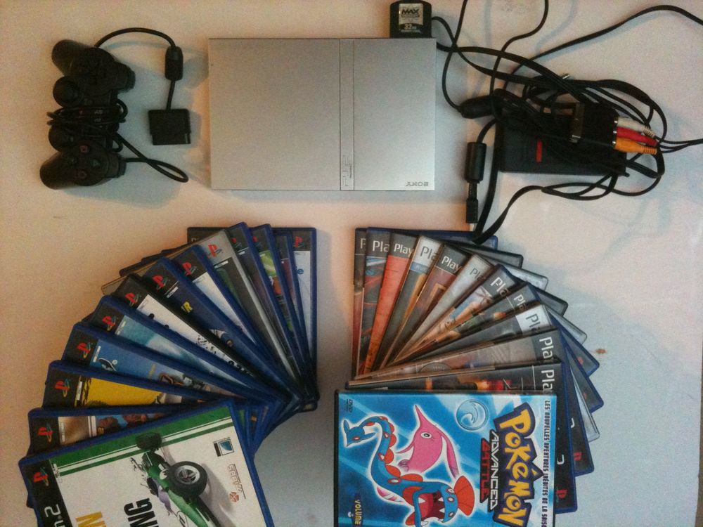 Sony PlayStation 2 slim aluminum Consoles et jeux vidéos