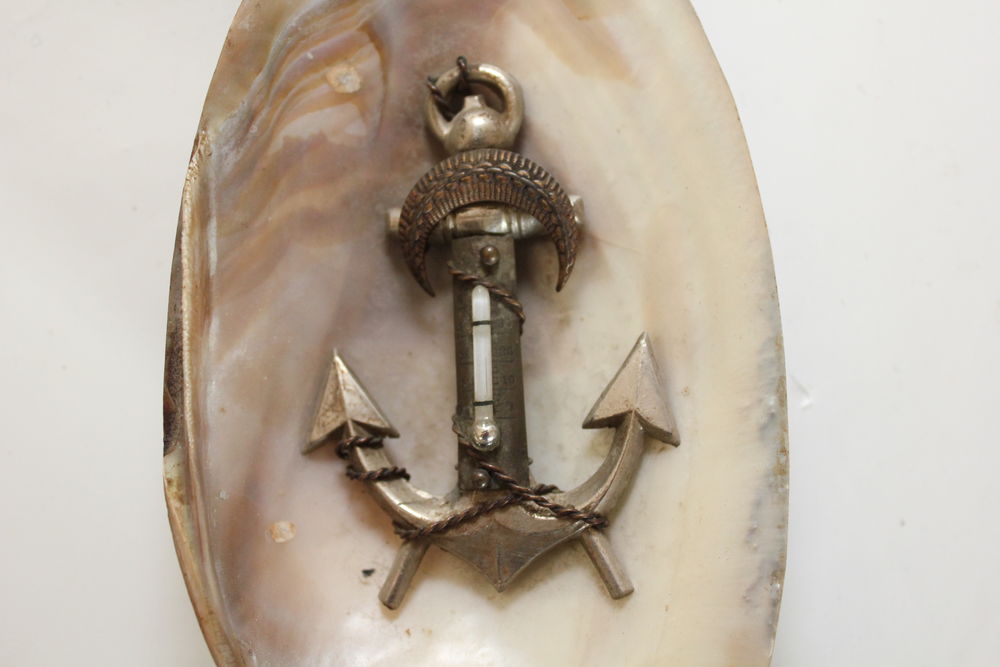 Souvenir du bord de mer ancre avec thermom&egrave;tre
coquillage 