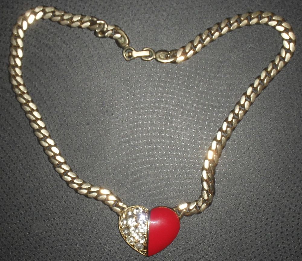 Collier dor&eacute; en maillon &eacute;pais avec un c?ur bicolore. Bijoux et montres