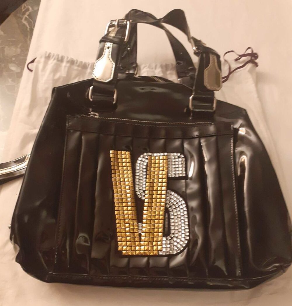 SAC &agrave;€ MAIN VERSUS Maroquinerie