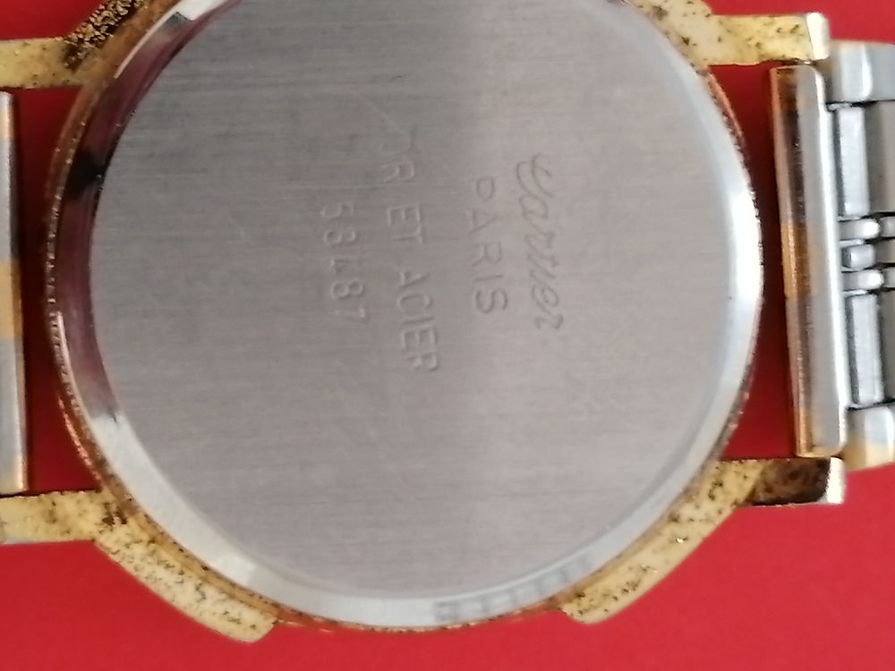 Montre quartz Cartier acier et dor&eacute; tres bon &eacute;tat g&eacute;n&eacute;ral Bijoux et montres