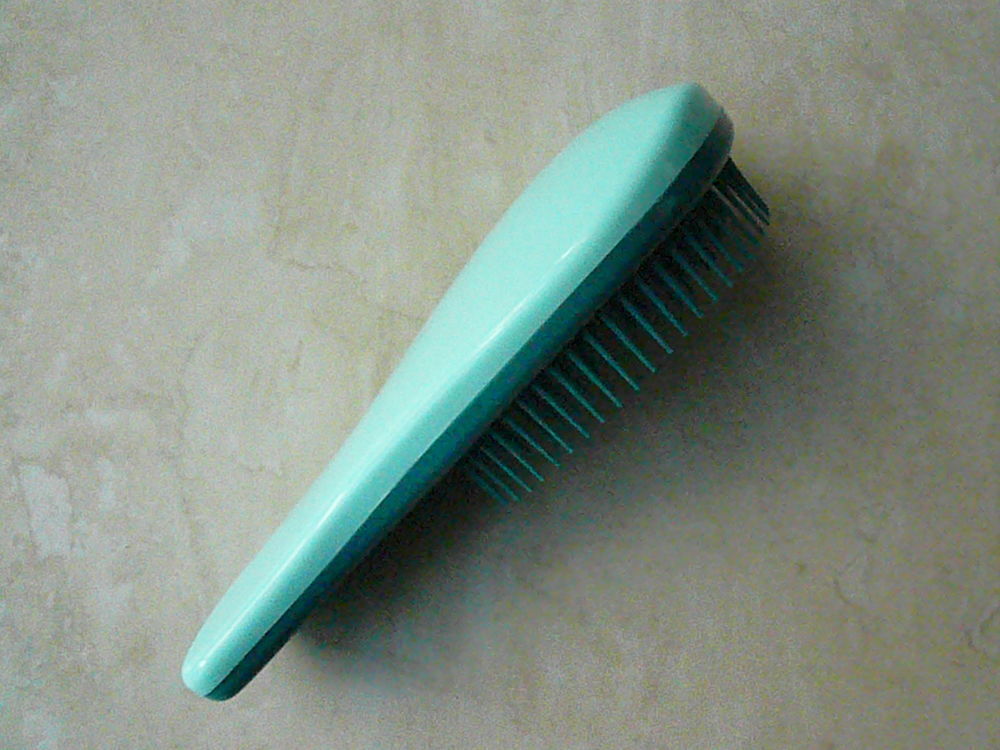 Brosse &agrave; cheveux de voyage Maroquinerie