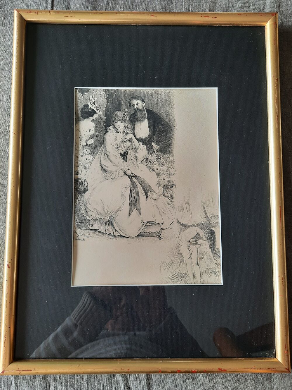 Dessin d'artiste sous verre avec un cadre dor&eacute;.
Décoration