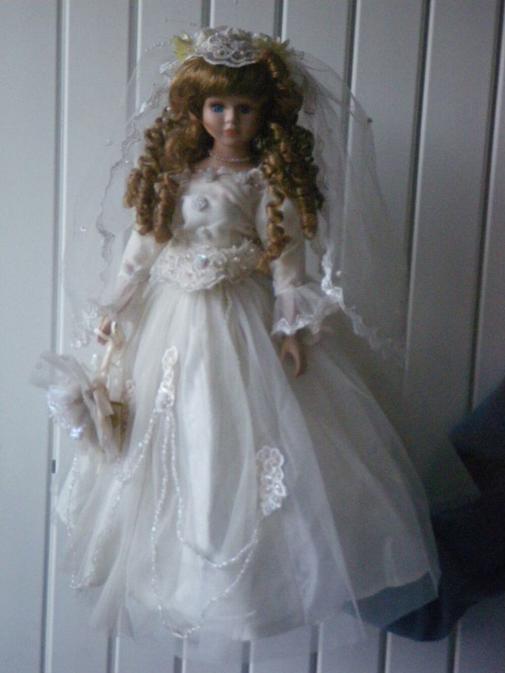 Poup&eacute;es en porcelaine 