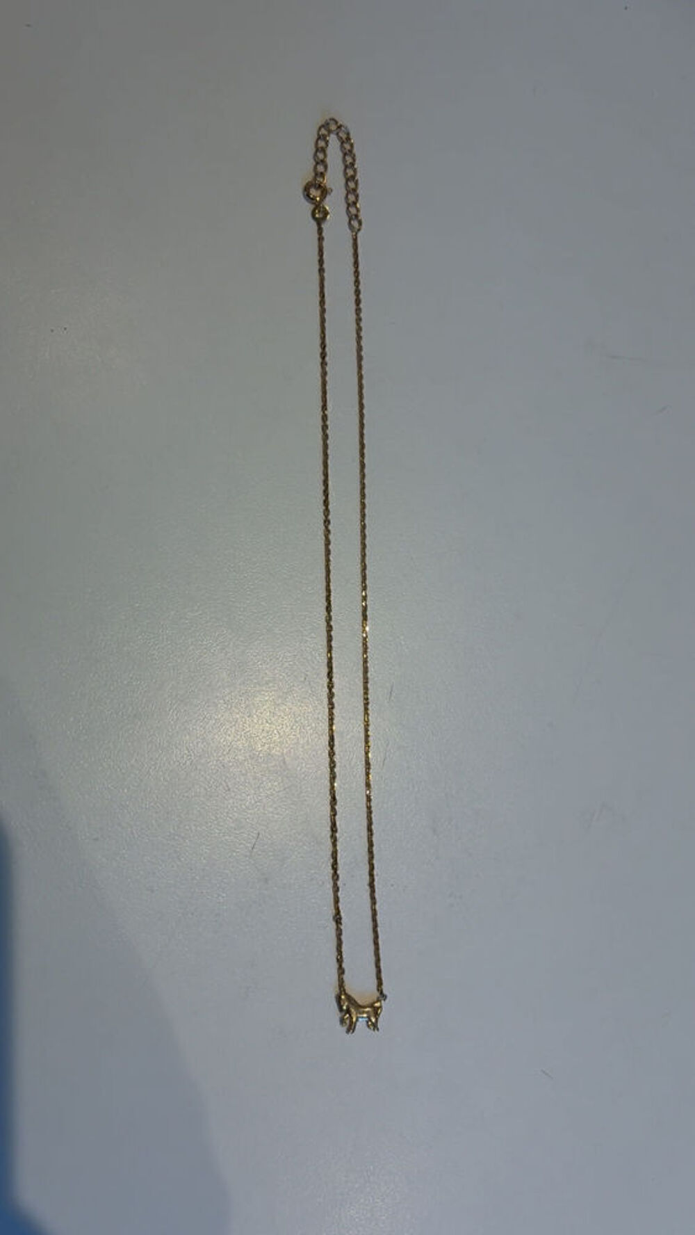 collier avec un cheval en plaqu&eacute; or Bijoux et montres
