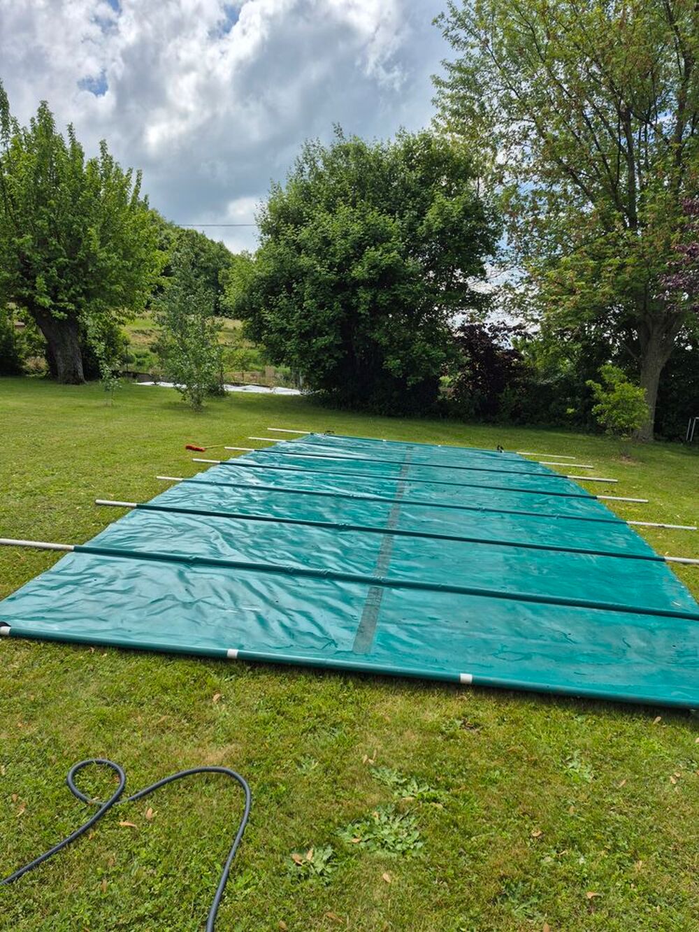 B&acirc;che piscine &agrave; barres Jardin