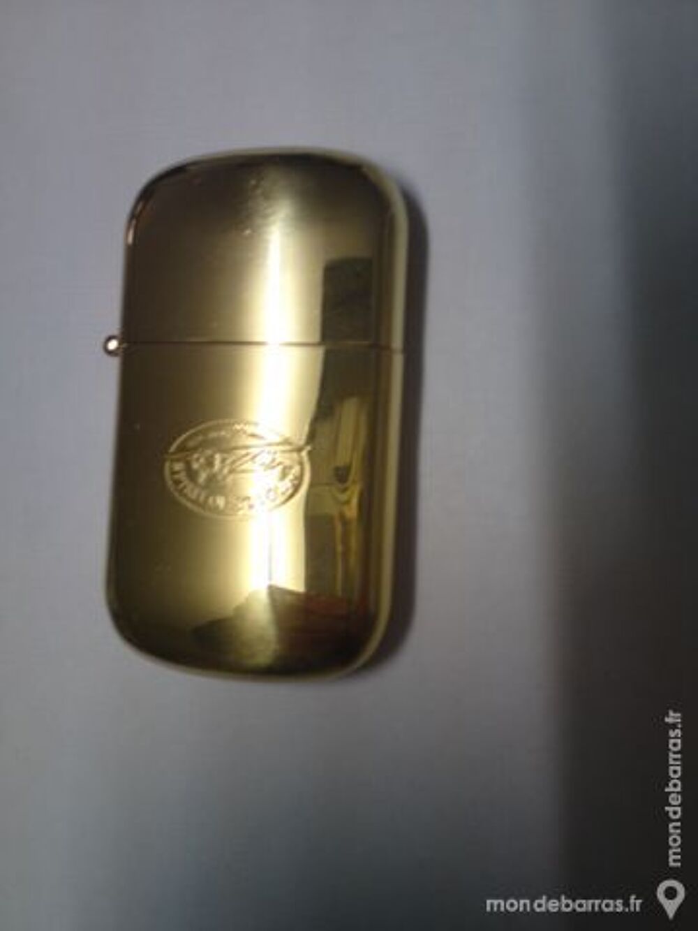 BRIQUET TEMPETE en laiton dore grave saint louis 