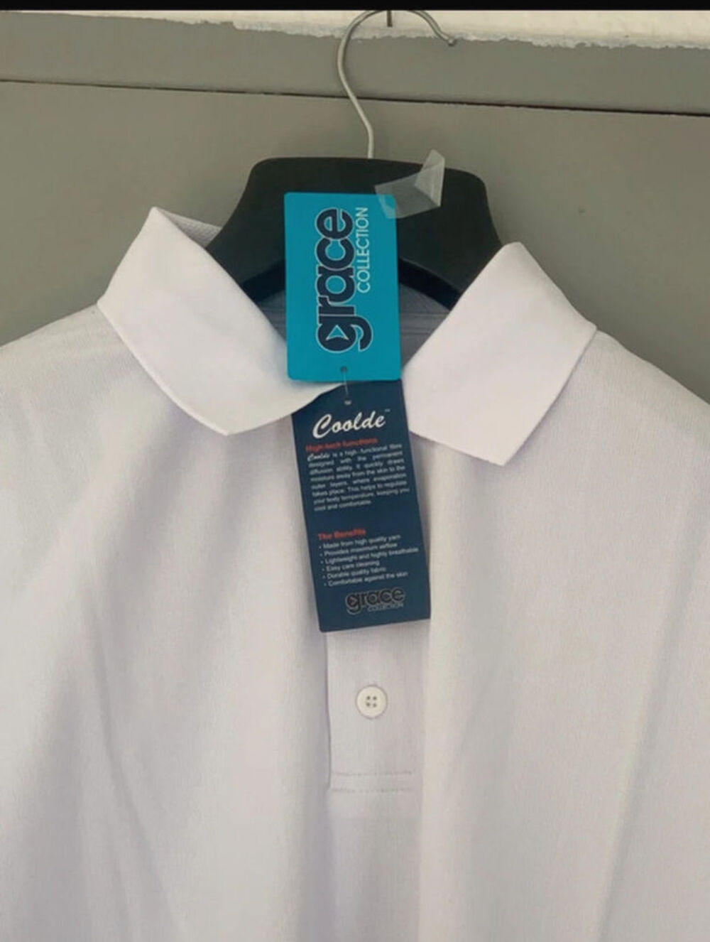 Polo blanc Marque Grace
Collection - Taille S Vêtements