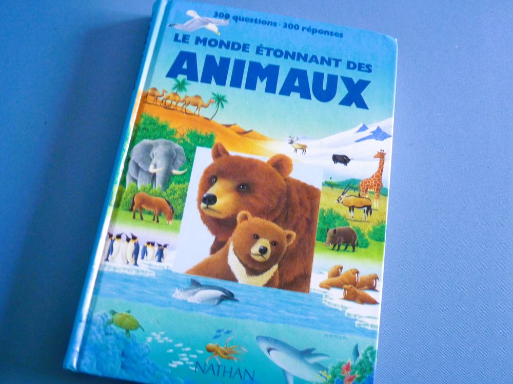 Livre Le monde &eacute;tonnant des animaux 300 questions 300 r&eacute;pons Livres et BD